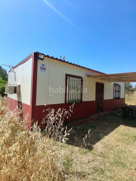 Foto 879bdf8b-f103-4ca1-ba3e-47d2387fc525. Casa amb piscina a Puebla del Río (La)