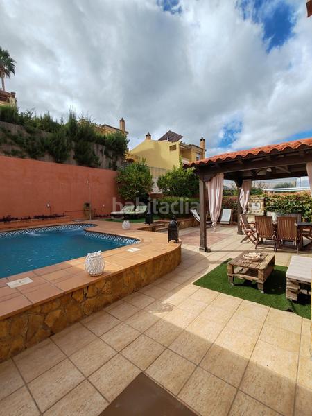 Foto 16e4a9ab-2b88-4531-a828-23d0a8479c5e. Chalet avec chauffage parking piscine dans La Zubia Ciudad Zubia (La)