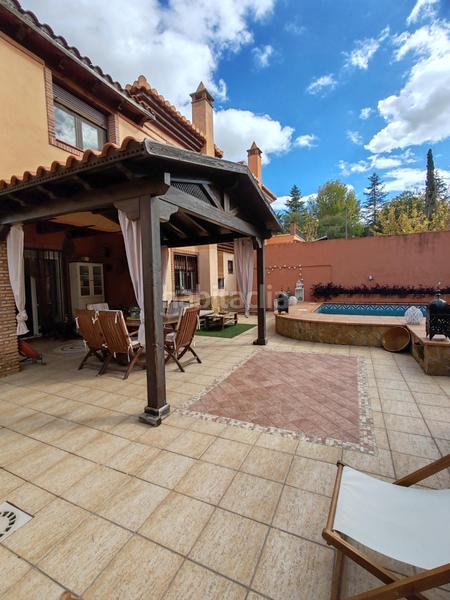 Foto f0f51b2e-aa62-441a-bd34-cff3a781e24e. Chalet avec chauffage parking piscine dans La Zubia Ciudad Zubia (La)