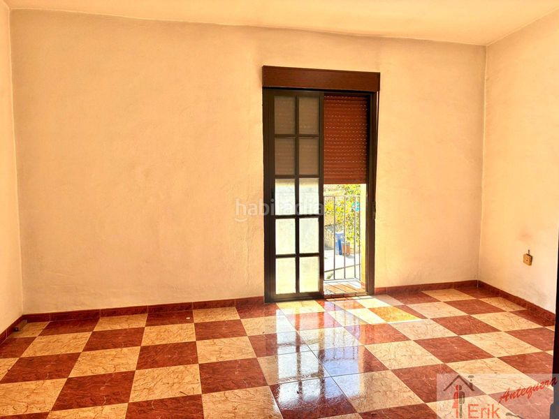 Foto 94c09019-d006-4f1c-86c3-fc4541a457ef. Casa adossada a Centro Antequera