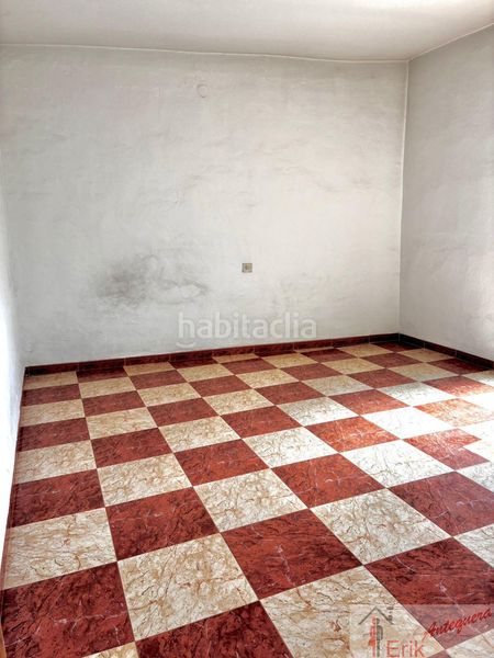 Foto c1ce802f-65e4-4240-b6db-f97030e7d08b. Casa adossada a Centro Antequera
