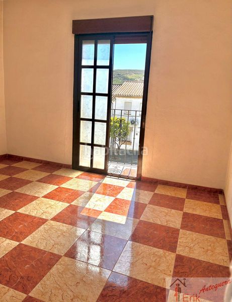 Foto f81d07f3-6bb1-47bd-87cc-61a7444416ab. Casa adossada a Centro Antequera