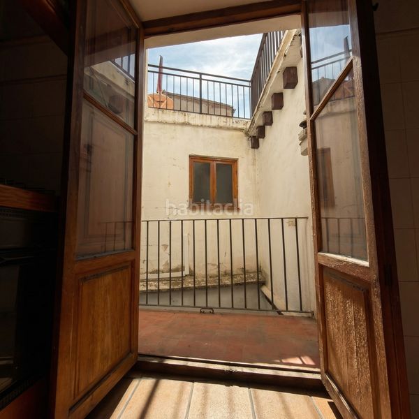 Foto 1f234ff5-88e2-40ee-8c4b-20eaea7646f8. Casa adossada a Xàtiva