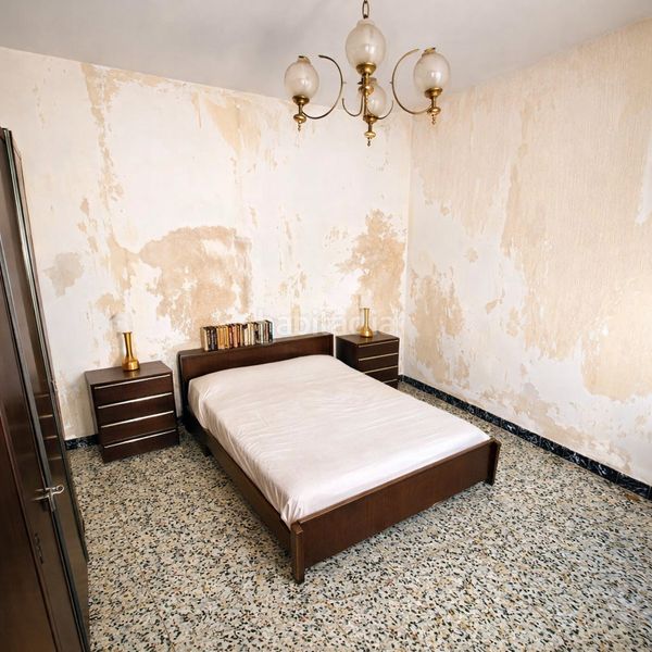 Foto f155ea01-edb1-4d7c-9ff7-7f9de892188c. Casa adossada a Xàtiva