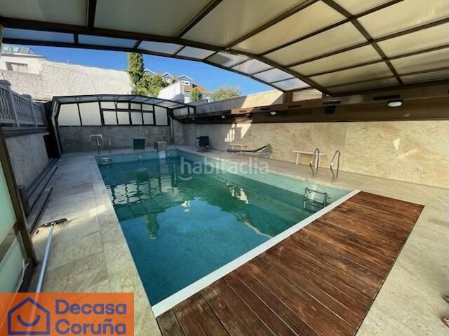 Foto 3dc8f6e2-13a9-4062-8bc0-5445d8059c5a. Xalet amb aparcament piscina a Maianca Oleiros