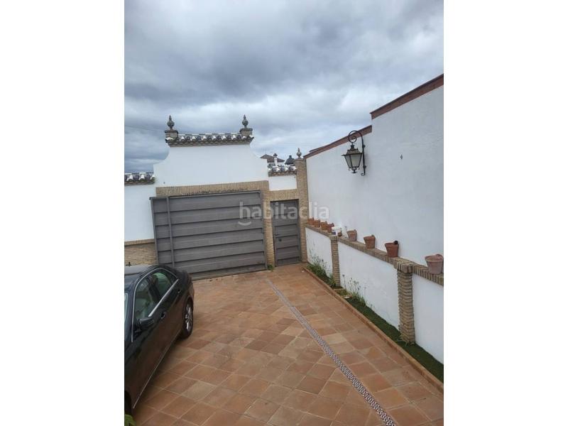 Foto fb6807f5-a867-4f09-ba3a-408e05ea22f1. Chalet con parcheggio piscina in Gines