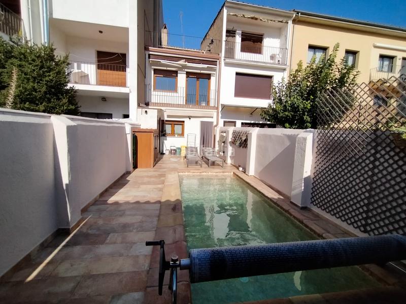 Foto 5b4d80cd-b11e-4518-ac4c-cd333b5b26bf. Casa con camino riscaldamento parcheggio piscina in Santa Coloma de Farners