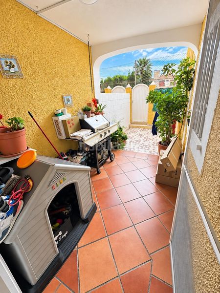Foto ee859bbf-6645-41ac-afef-b0aa8a4be748. Casa adossada amb aparcament piscina a La Font-Mezquitas San Juan de Alicante