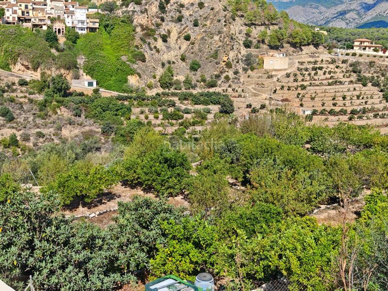 Foto bd32f5cf-afac-4211-8a1d-4af92e4741e2. Terrain résidentiel dans La Nucia Pueblo Nucia (la)