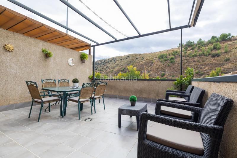 Foto 516f49c4-94c1-4834-af6c-2f483b42570d. Casa adossada amb calefacció aparcament a Crta. De la Sierra Granada