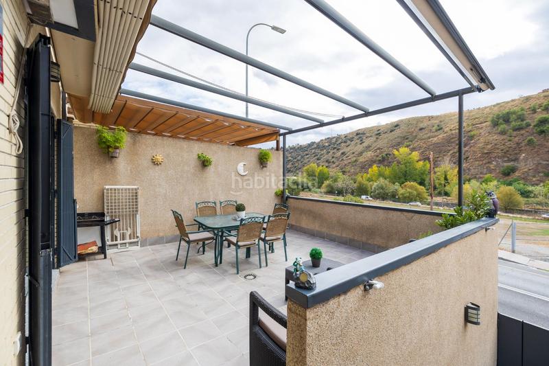 Foto f4e06921-cf53-4e22-bccb-8f10673af972. Casa adossada amb calefacció aparcament a Crta. De la Sierra Granada