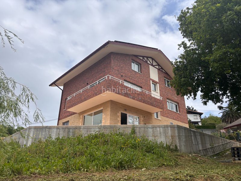 Foto fa7e8fae-6181-4c6e-8dbe-042e61a5a1e5. Xalet amb xemeneia calefacció aparcament a Barrika