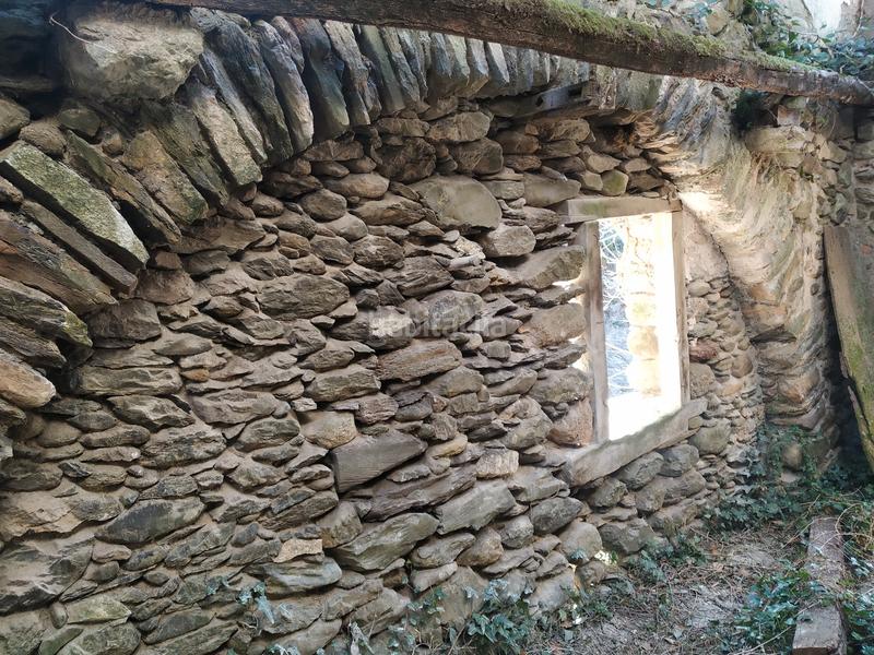 Foto c03b7446-6cf0-46db-a1d5-d45f20ee4cb6. Masía antiguo molino con terreno extenso en Camprodon