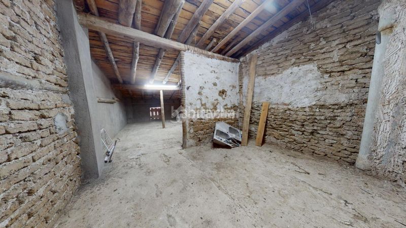 Foto cf72b699-3065-4ad0-b924-49a80c5b1140. Casa aparellada a Torrelaguna