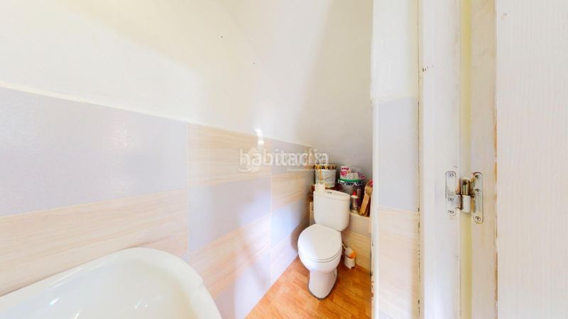 Foto b168ad65-ec3f-4a63-a9e1-67324cfd5443. Casa aparellada a Torrelaguna