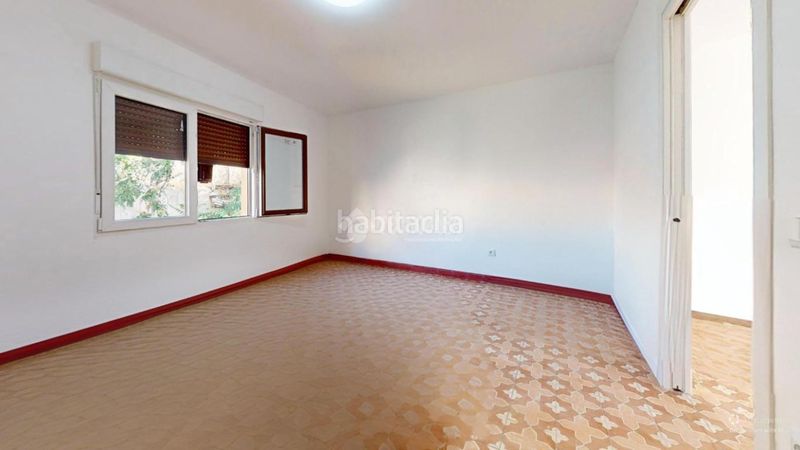 Foto f67ed13a-9ce1-4ba9-8749-b8907e23fb64. Casa aparellada a Torrelaguna