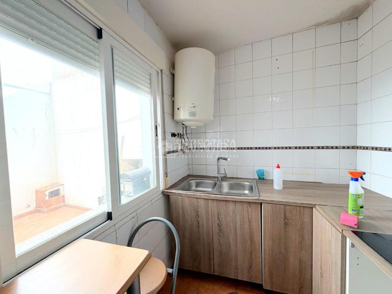 Foto 519bccda-3681-44f5-bfb4-6649fb39ae97. Casa aparellada a Torrelaguna