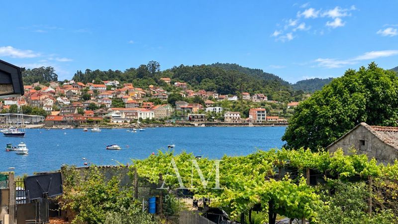 Foto a166885c-9c2e-404a-934d-3c9ed9484b2a. Casa aparellada amb calefacció aparcament a O Hío Cangas