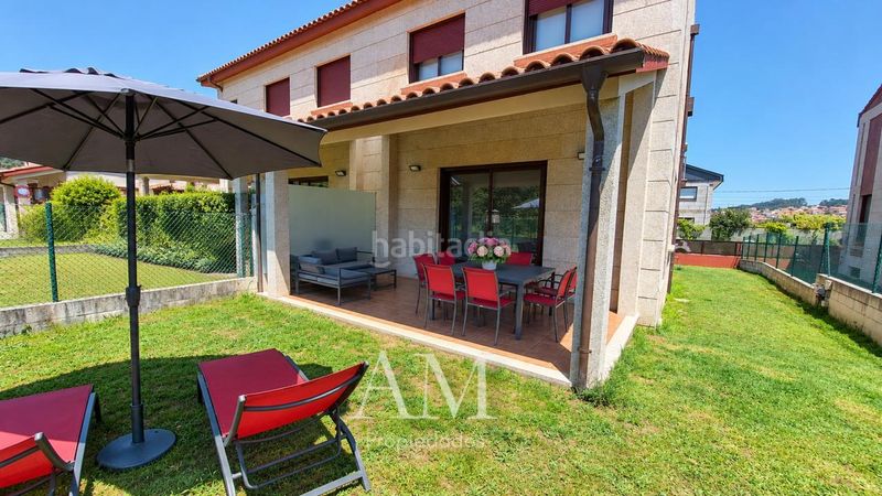 Foto d3d16909-2d7c-4c6d-a087-00d7f158f3f1. Casa aparellada amb calefacció aparcament a O Hío Cangas
