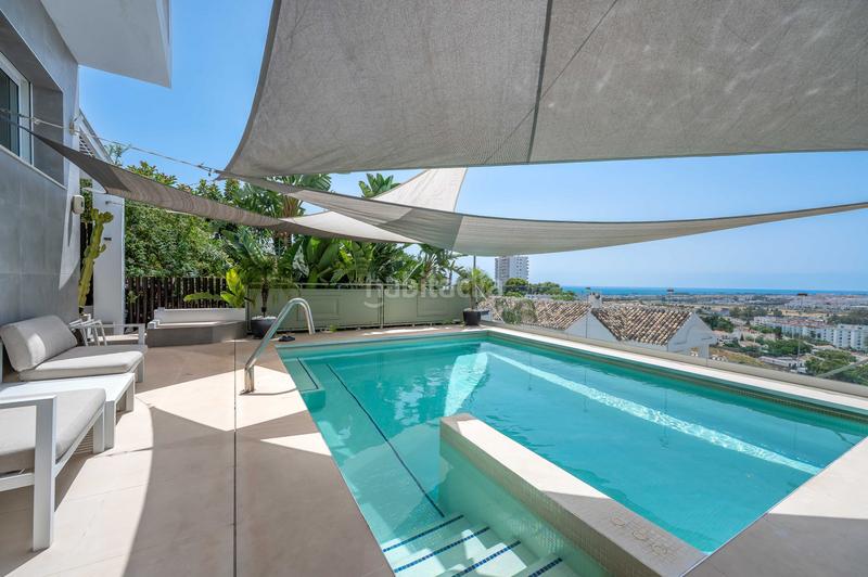 Foto 90cca972-0353-42e5-870d-089114d0307e. Casa amb aparcament piscina a Nueva Andalucía centro Marbella