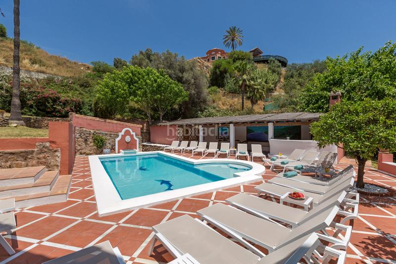 Foto 36fac4be-a500-48f3-bff8-a1d6851cd862. Casa con parcheggio piscina in Los Naranjos Marbella