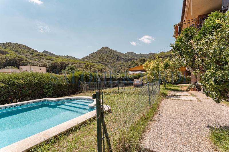 Foto c158ee9a-0464-4290-8f16-a42152af8220. Maison avec cheminée chauffage parking piscine dans Argentona