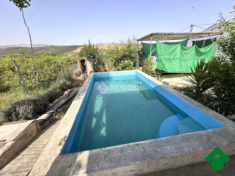 Foto 7df02893-d105-4dfd-981c-015e53766c9c. Masia amb piscina a Álora