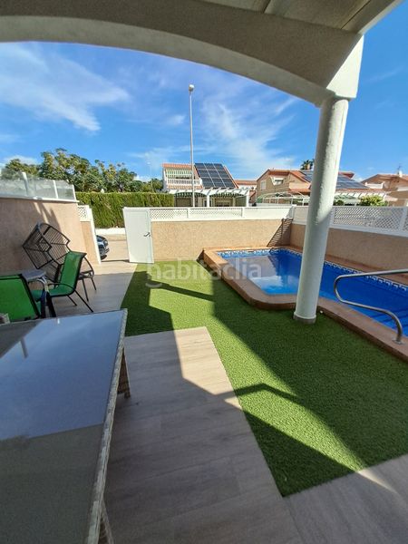Foto 0ffe3791-f224-4023-a088-304f2bd208eb. Casa adosada triplex en las villas, torre horadada, 4 habitaciones en Pilar de la Horadada