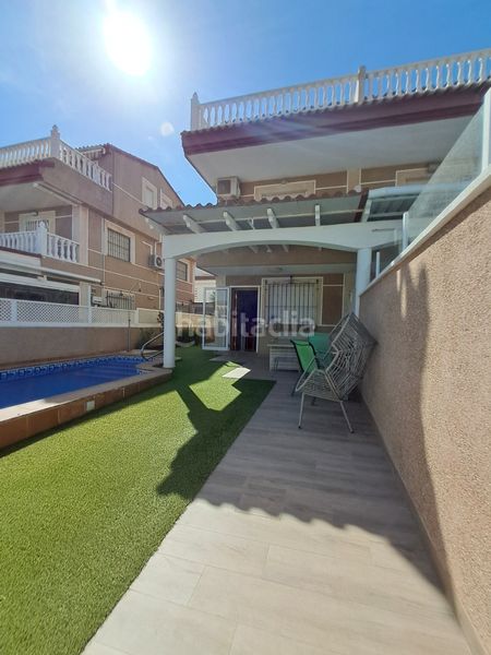 Foto fc9ed368-b22c-4a2b-9813-d9f6660b88cd. Casa adosada triplex en las villas, torre horadada, 4 habitaciones en Pilar de la Horadada