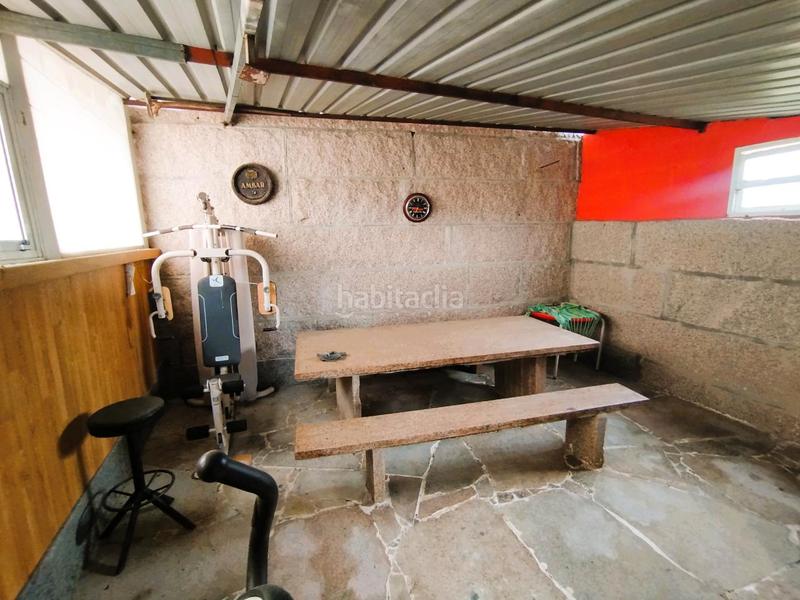 Foto 07906898-1a05-4658-b79d-040b76c7a090. Chalet  de piedra con jardín en Mos