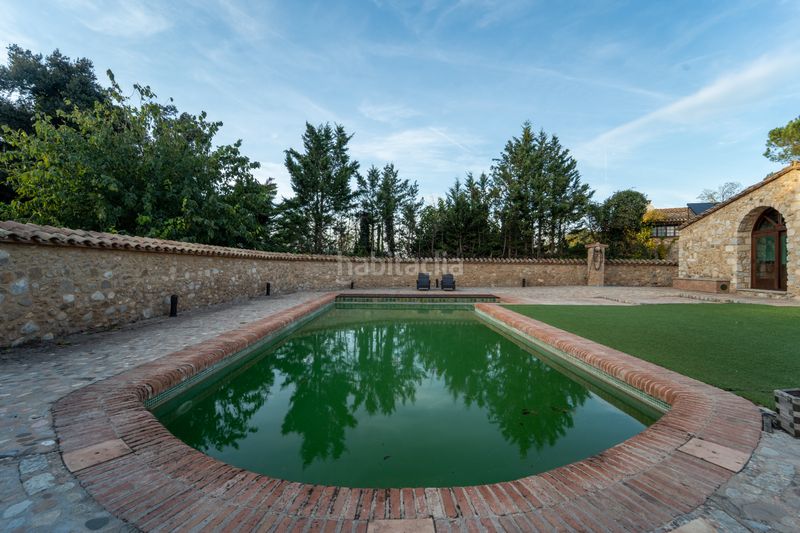 Foto a151f4dd-842e-4b3c-b3ab-33fb2d6b1e8d. Masia amb xemeneia calefacció aparcament piscina a Sant Joan de Mollet