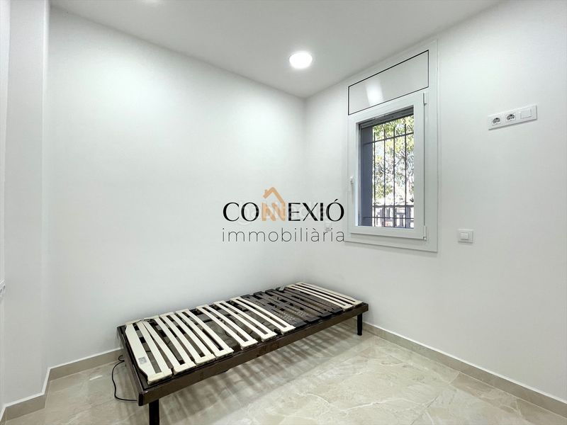 Foto b7d1a85e-5058-453a-b187-c7cd49f99dd7. Planta baixa amb xemeneia calefacció a Sarrià de Ter