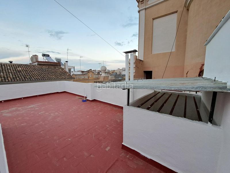 Foto 51268baf-3a7b-4097-b51d-cf3065a3e9db. Casa  en venta con dos pisos altos y bajo comercial en zona centrica en Alzira