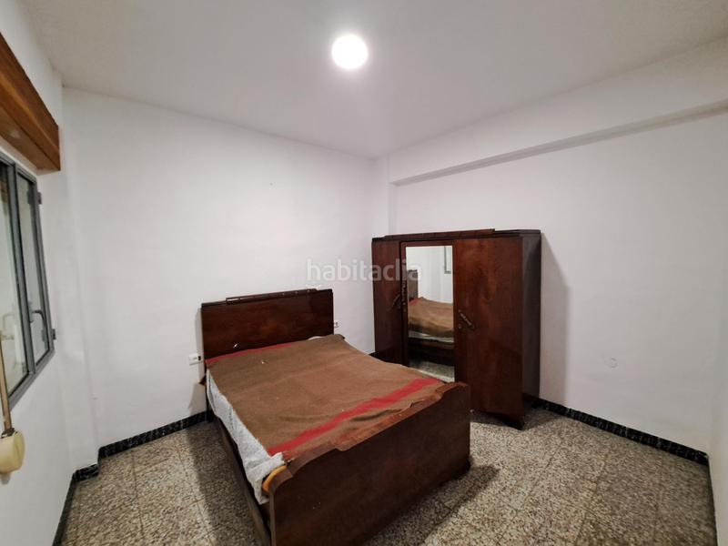 Foto c5b80d3d-12d9-4b21-8487-44b617980fb5. Casa  en venta con dos pisos altos y bajo comercial en zona centrica en Alzira