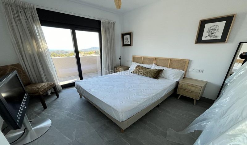 Foto 06d3e50f-de29-4a88-8378-7b50894054d5. Casa aparellada amb calefacció aparcament piscina a Polop