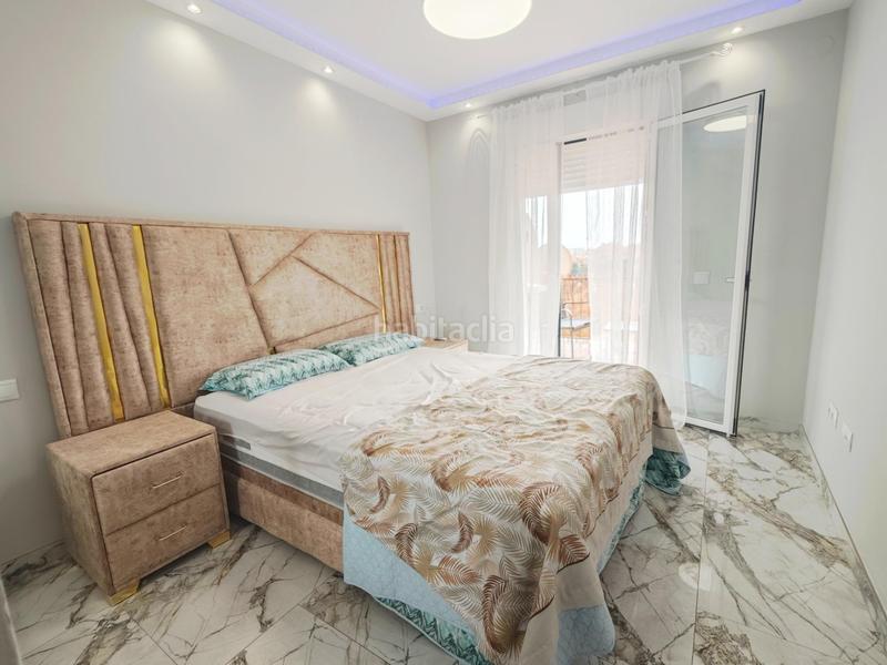 Foto 5a0dbff1-a75b-44f1-84d6-81e620683d05. Alquiler planta baja alquiler temporada piso 2 dormitorios, 1 baño, terraza con vistas, piscina y garaje costa en Mijas