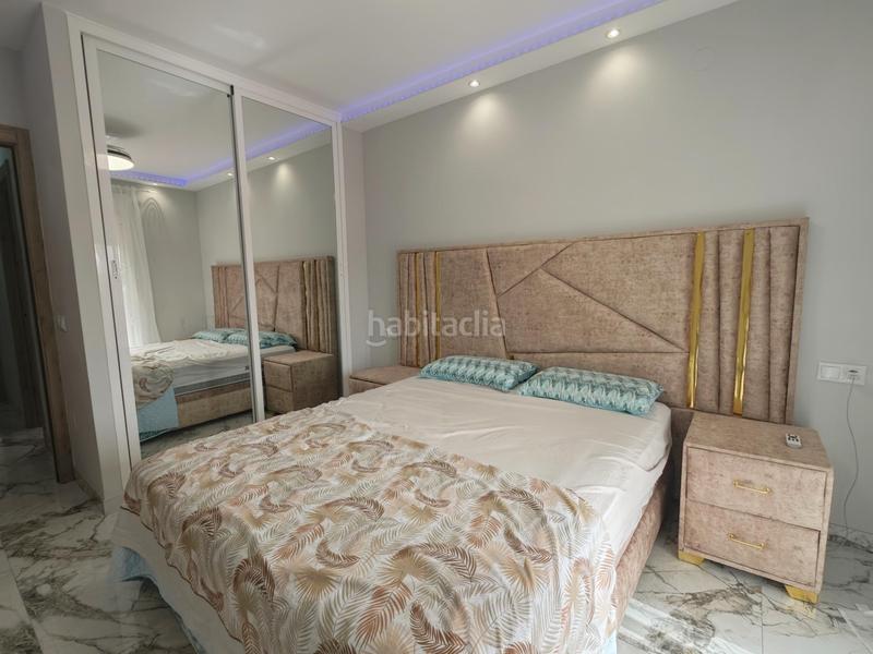 Foto 615b84de-d3ce-4cc3-81dc-410e92e85532. Alquiler planta baja alquiler temporada piso 2 dormitorios, 1 baño, terraza con vistas, piscina y garaje costa en Mijas