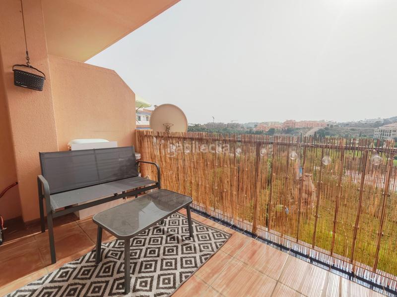 Foto 8d85043d-1c47-4c00-a2c2-2d52890125c0. Alquiler planta baja alquiler temporada piso 2 dormitorios, 1 baño, terraza con vistas, piscina y garaje costa en Mijas