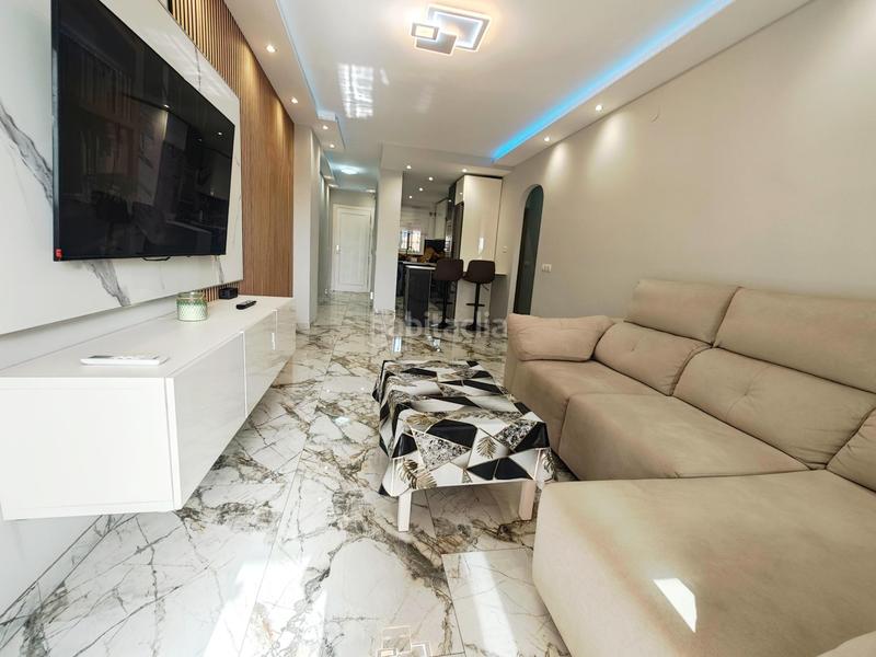 Foto c598a900-158b-458d-b956-3914f9917d65. Alquiler planta baja alquiler temporada piso 2 dormitorios, 1 baño, terraza con vistas, piscina y garaje costa en Mijas