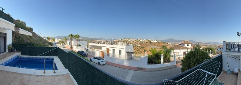 Foto 4c7cd742-3f1e-4017-bb09-fbea2ead5dd6. Chalet avec parking piscine dans Coín