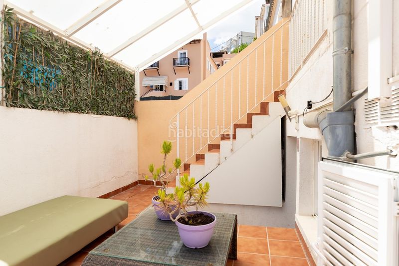 Foto 8f859493-8102-4e96-9c93-48b7cdcc0e0c. Casa aparellada amb calefacció aparcament a Cala Major Palma de Mallorca
