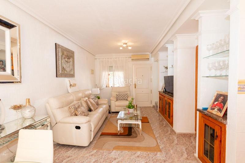 Foto 1f3b6b8c-a1b8-4d3f-b200-005d74f7412e. Casa aparellada amb piscina a La Regia Orihuela