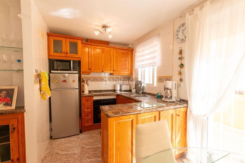 Foto 970e3b38-c209-4a4b-b75f-3e9a696ad64e. Casa aparellada amb piscina a La Regia Orihuela