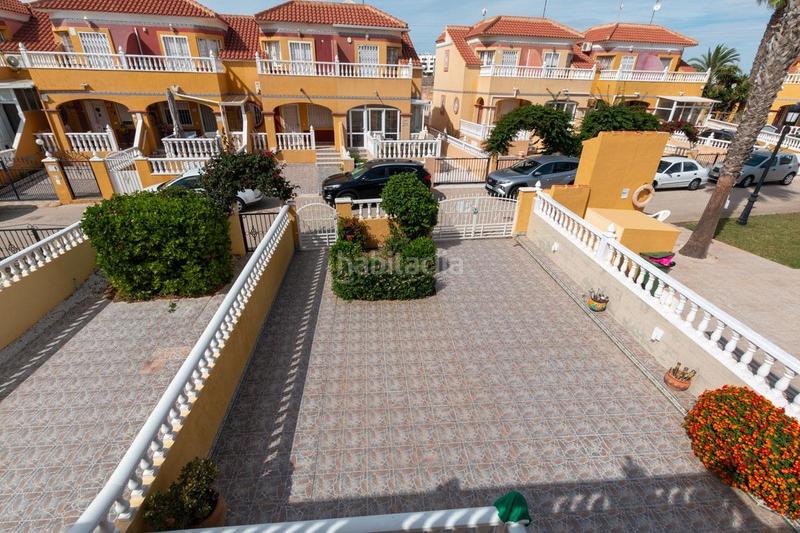 Foto b9a1e108-9cad-4895-89ff-b7ee389abd34. Casa aparellada amb piscina a La Regia Orihuela