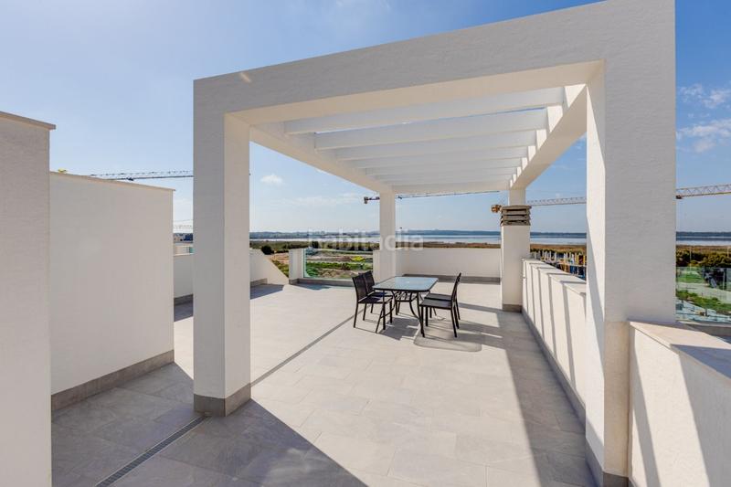 Foto 41370b39-b3a0-4890-98a8-27d45637fb1f. Casa pisos nuevos, de 2 o 3 dormitorios con garaje, piscina comunitaria, spa y gimnasio. en Guardamar del Segura