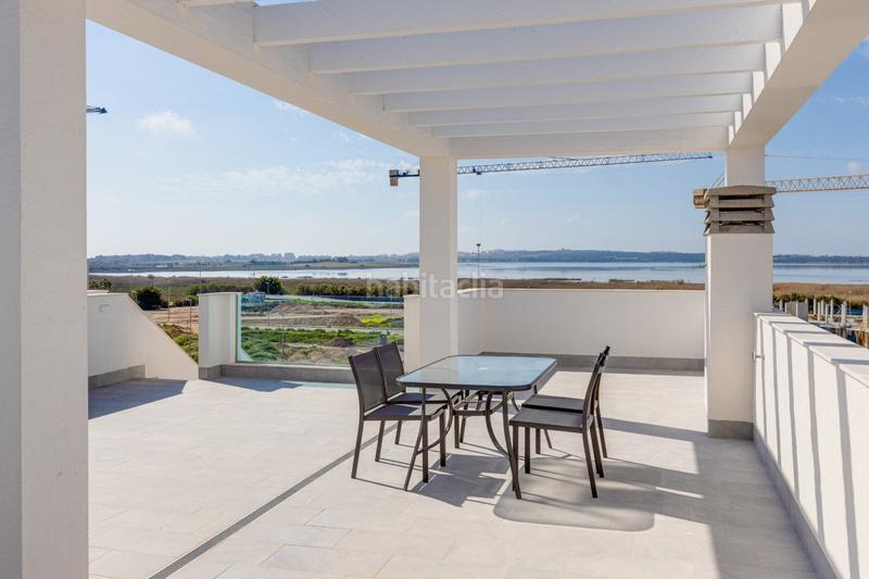 Foto e6bf85e0-17e7-42eb-a6c8-e5ff511fd217. Casa pisos nuevos, de 2 o 3 dormitorios con garaje, piscina comunitaria, spa y gimnasio. en Guardamar del Segura