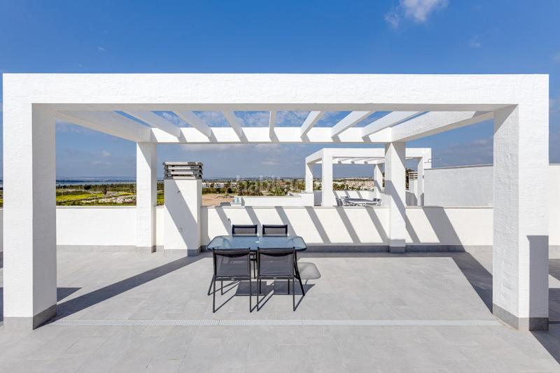 Foto f20ac415-2ee5-458c-8642-dd9dd4513279. Casa pisos nuevos, de 2 o 3 dormitorios con garaje, piscina comunitaria, spa y gimnasio. en Guardamar del Segura