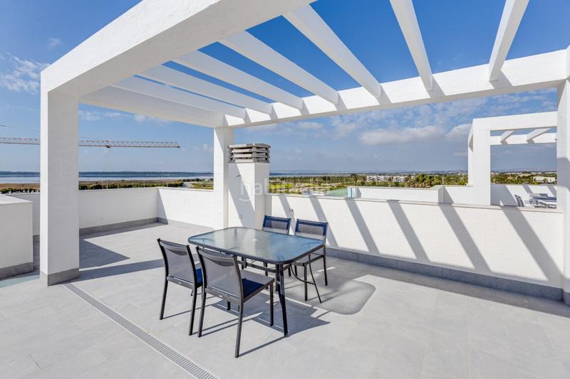 Foto f93ec18f-982a-4062-9690-2fe5831803c4. Casa pisos nuevos, de 2 o 3 dormitorios con garaje, piscina comunitaria, spa y gimnasio. en Guardamar del Segura