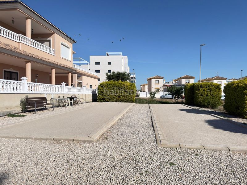 Foto 31316c7a-3bb9-46f6-a324-2b39573e292c. Apartament amb calefacció aparcament piscina a Villamartín-Las Filipinas Orihuela