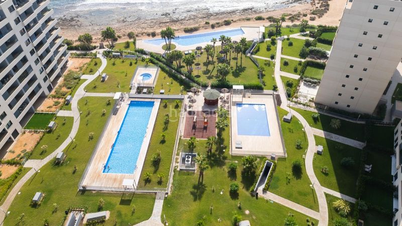 Foto b2053a42-deeb-4d21-9a4a-382f22f25409. Apartament amb aparcament piscina a Punta Prima Torrevieja